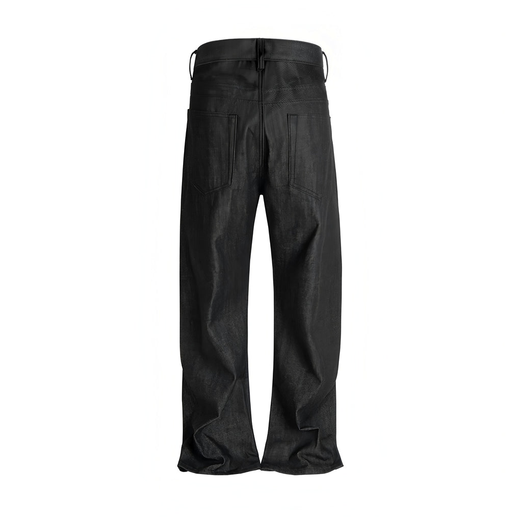 Back view of RAW BLACK DENIM straight-leg pants with rear patch pockets and raw cotton texture