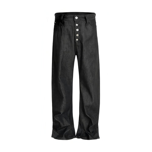 Flat lay of RAW BLACK DENIM straight-cut pants with five-button fly and matte raw cotton fabric