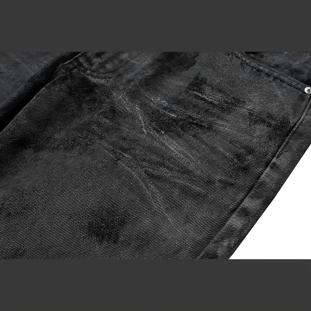 Close-up black tonal camo denim fabric texture and rivet detail