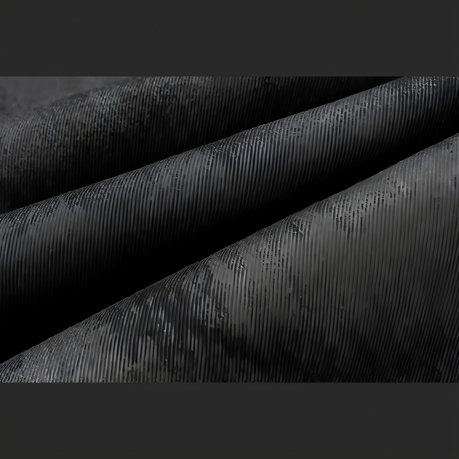 Macro shot black tonal camo denim fabric weave and ribbed texture